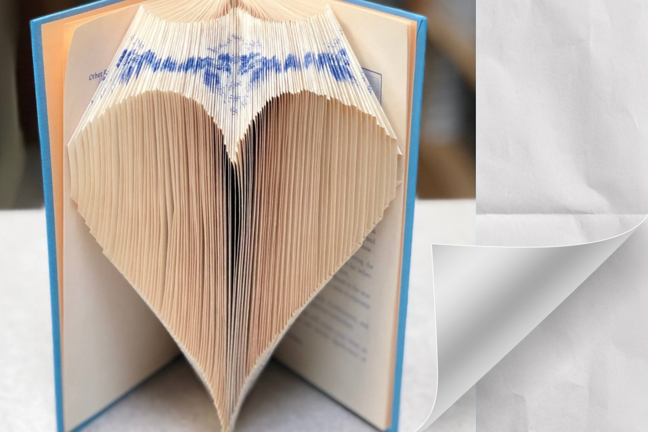 book with pages folded into a heart