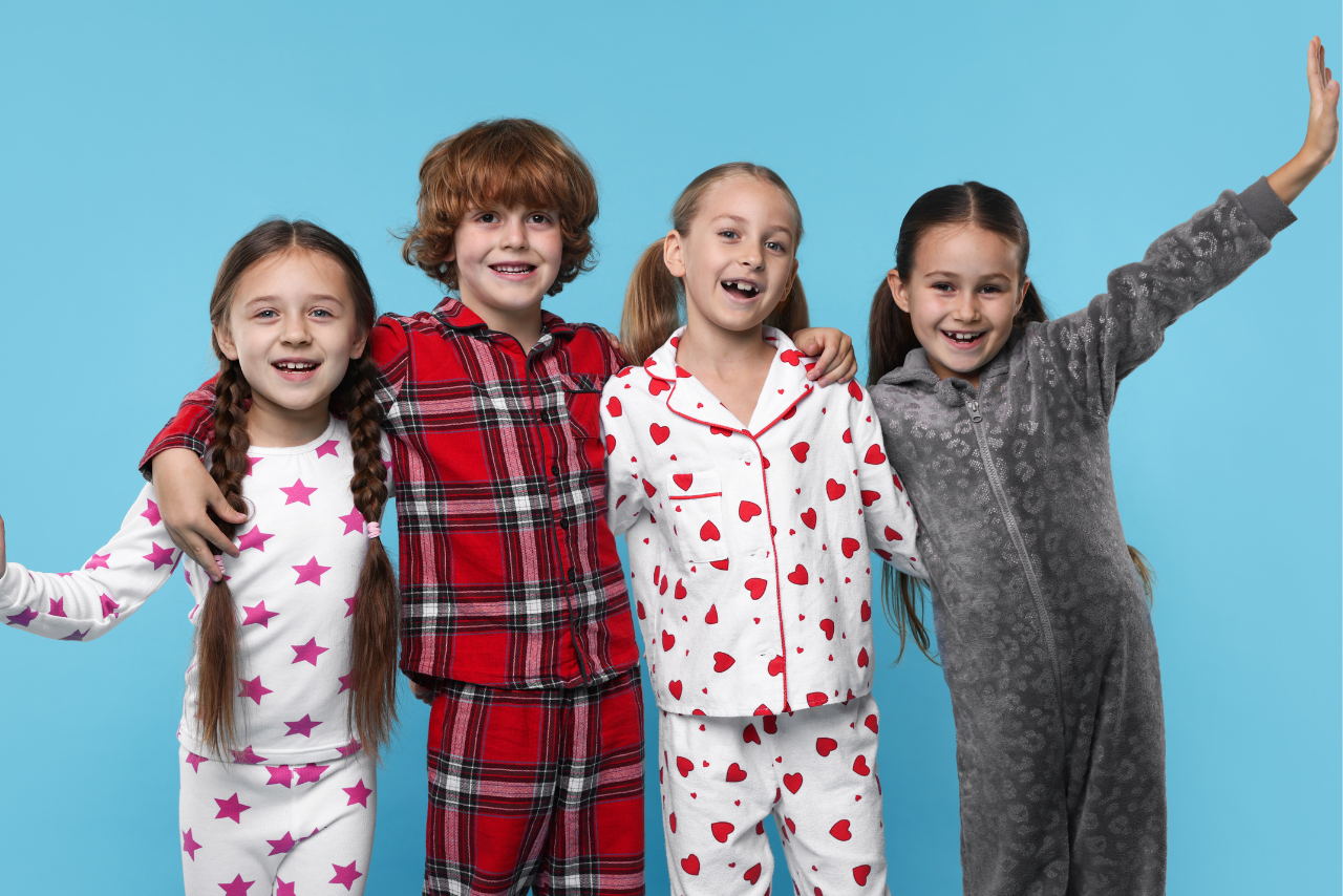 4 children in pajamas 